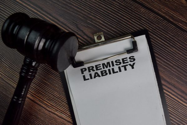 premises liability typed across paper secured to a clipboard