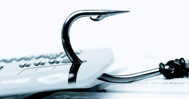 Fishing hook going through a retail tag.