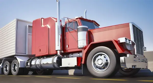 Giant, red semi truck driving down a highway.