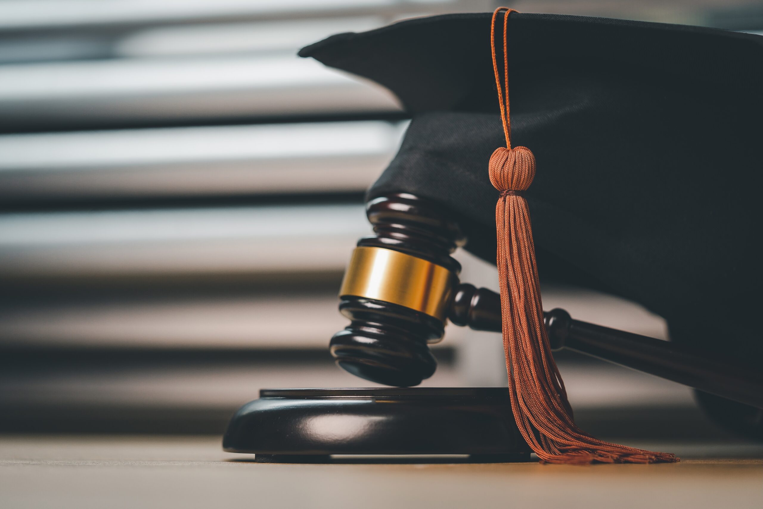 Black Graduation Hat and Gavel Concept of law school.